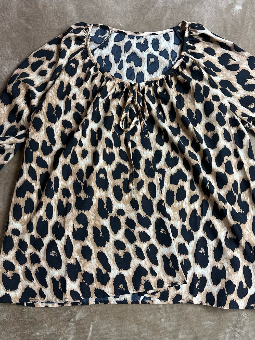 Womens Leopard Prints and solid tops for sale.